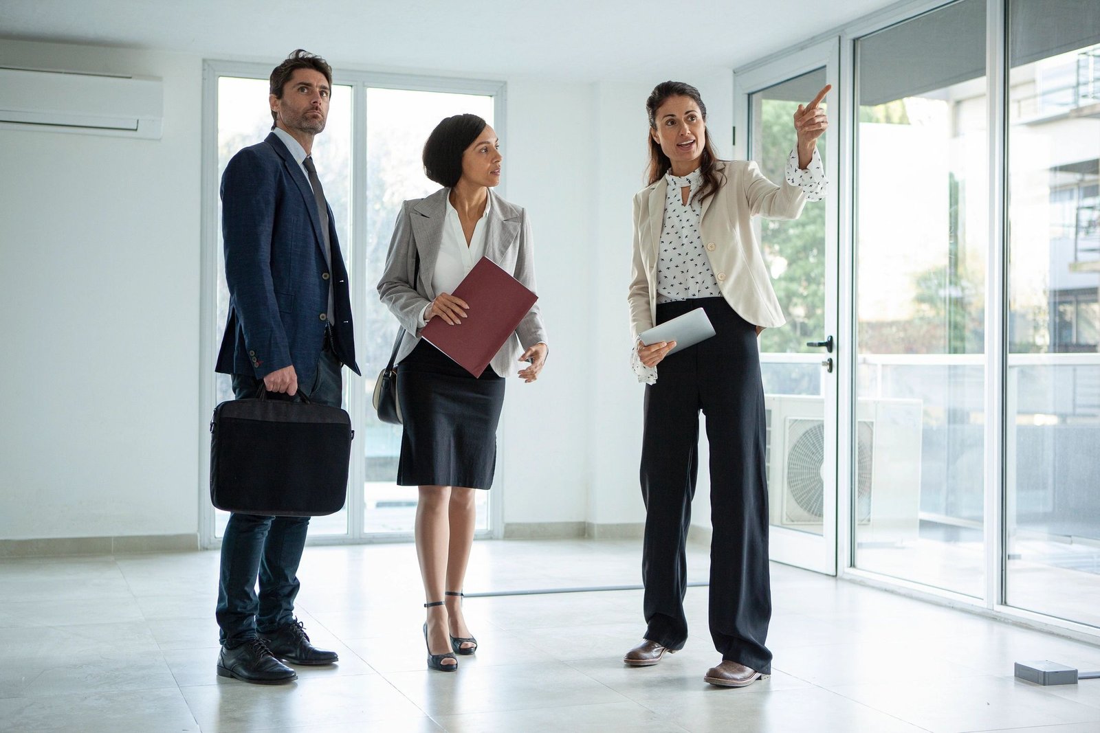 Real estate team discussing property operations