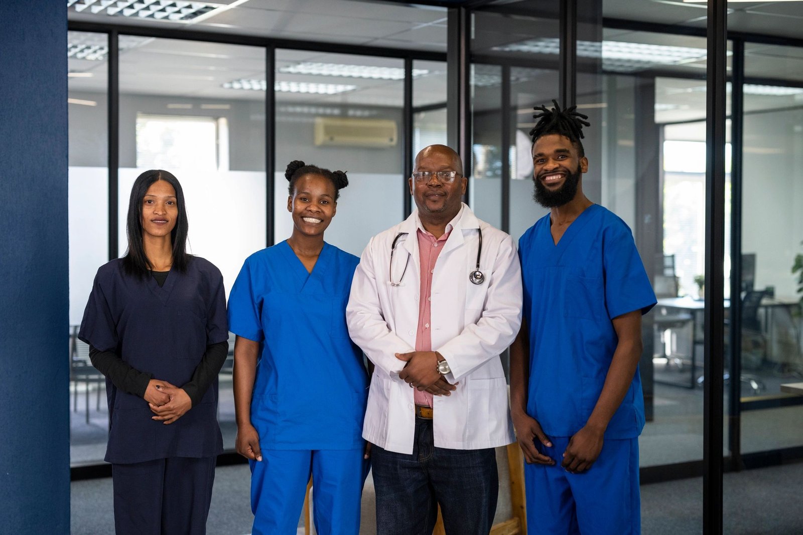 Healthcare team in a clinical setting representing healthcare IT support